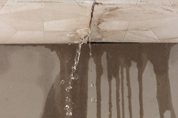 Professional Flood Damage Cleanup technician working in Powellton, WV